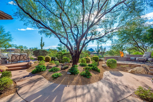 Luxury house for sale in Scottsdale (United States) - Desert patio with fireplace and outdoor furniture