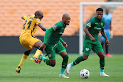 Goodman Mosele of Baroka challenged by Lebogang Manyama of Kaizer Chiefs during the DStv Premiership 2020/21 match between Kaizer Chiefs and Baroka at the FNB Stadium, Johannesburg on the 26 January 2021.