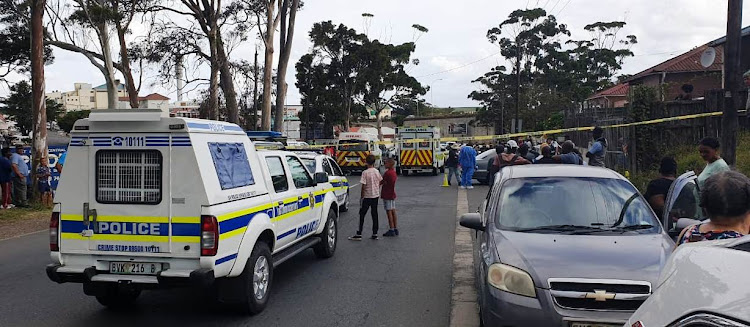 Police cordoned off the scene where a prominent East London businessman was gunned down on Saturday afternoon.