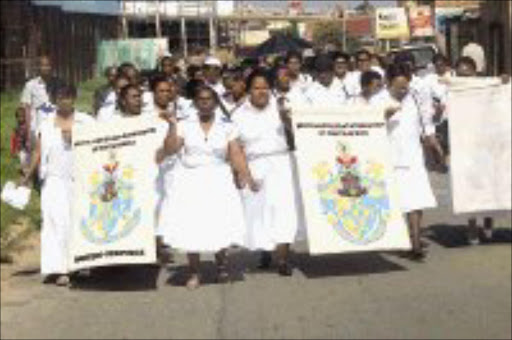 PRAYER: Daasa members at an awareness campaign in Diepkloof. Pic. Veli Nhlapo. 18/11/07. © Sowetan.