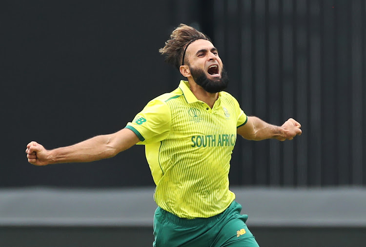 South Africa's Imran Tahir celebrates the wicket of Pakistan's Imam-ul-Haq.