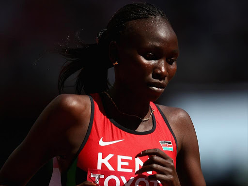 BEIJING, CHINA - AUGUST 27: Viola Jelagat Kibiwot of Kenya competes in the Women's 5000 metres heats during day six of the 15th IAAF World Athletics Championships Beijing 2015 at Beijing National Stadium on August 27, 2015 in Beijing, China. (Photo by Ian Walton/Getty Images) *** Local Caption *** Viola Jelagat Kibiwot