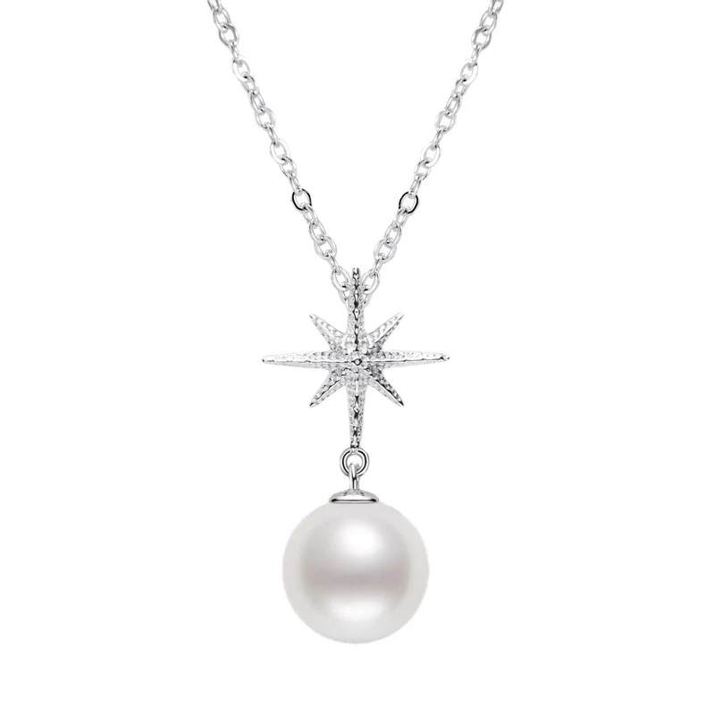 Zilveren ketting met zespuntige ster en parel, fashion minority design. Een stijlvolle en unieke accessoire voor elke gelegenheid.