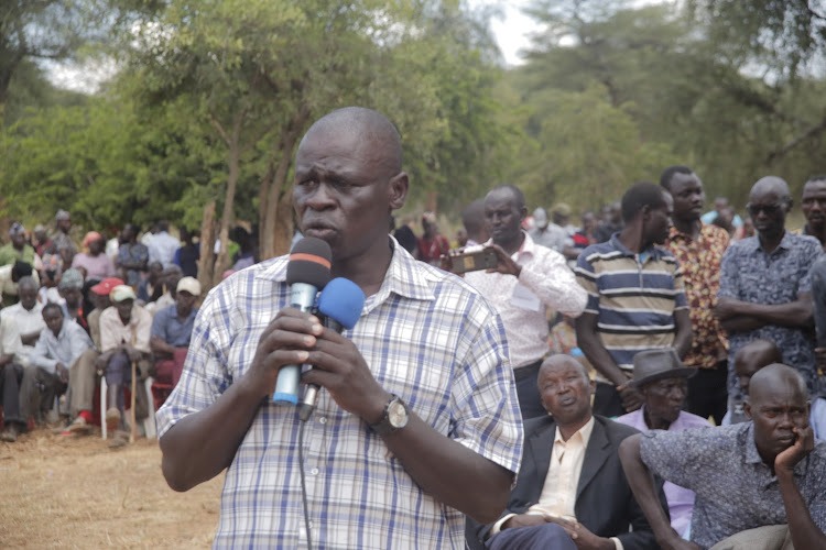 Former Bartabwa MCA Reuben Chepsongol addresses mourners during the burial of GSU officer John Kisoi at Kukui, Baringo North, on Saturday