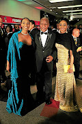 Jessica Motaung, left, Kaizer Motaung and Kemiso Motaung during the PSL Player of the Year awards at Sandton Convention Centre in Johannesburg.   / Veli Nhlapo