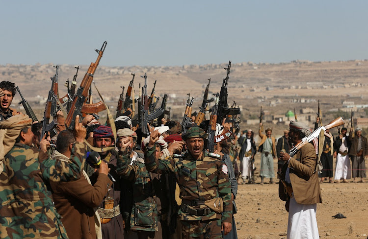 Houthi fighters and tribal supporters protest against recent US-led strikes on Houthi targets, near Sanaa, Yemen, January 14 2024. Picture: KHALED ABDULLAH/REUTERS