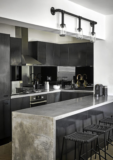 This black kitchen design is all about celebrating rough edges.