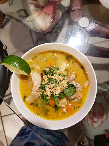 Thai Chicken Stew, topped with cilantro, chopped peanuts and a squeeze of lime. 