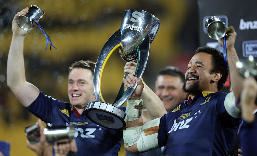 The Highlanders Ben Smith and Nasi Manu celebrate winning the Super Rugby title against the Hurricanes last year.