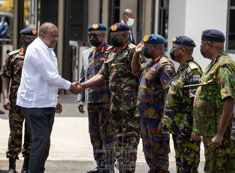 President Uhuru Kenyatta with KDF chiefs during the opening of the Ulinzi Sports Complex, Langata, Nairobi, on April 13, 2022