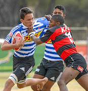 Luke Carew of Western Province tackled by Godwin Fillis of Eastern Province on day four of the 2017 U/13 Coca-Cola Craven Week at Grey College on Friday in Bloemfontein.