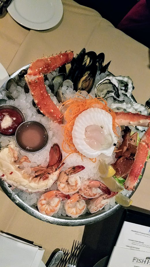 A Nice Dinner at Ringside Fish House with a Fresh Seafood Platter arranged with King Crab Legs, Hokkaido Scallop, Gulf Prawns, Oysters, Mussels, Manila Clams, House Smoked Salmon