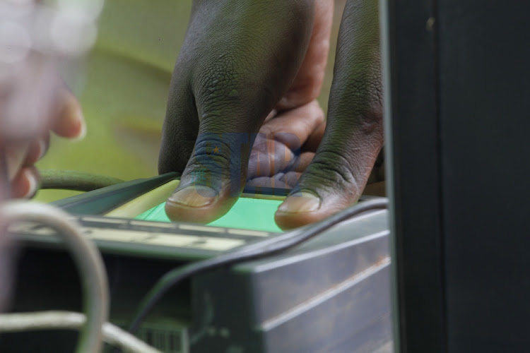 A voter's finger print is taken through the BVR system as one undergoes voter registration on January 17,2022. PHOTO/ENOS TECHE