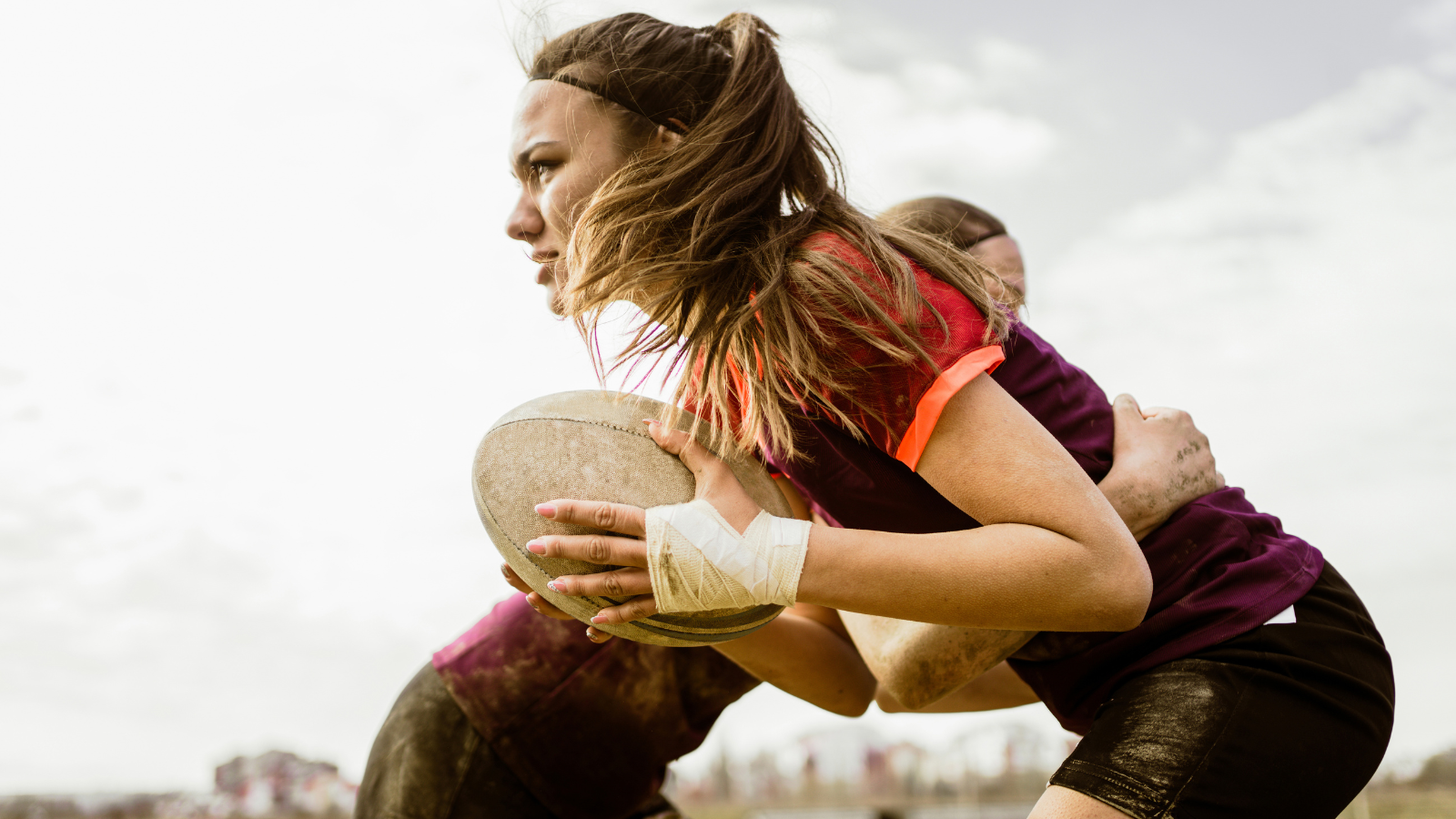 Rugby player is being tackled. Rugby shoulder injury mechanism includes a force to the medial clavicle or to the posterolateral aspect of the shoulder can cause a sternoclavicular injury.