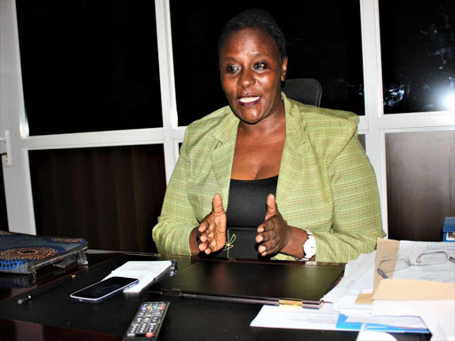 Gender executive Maureen Mwangovya in her office on February 18 / ELIAS YAA