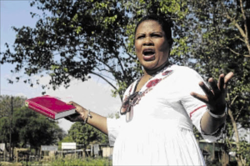 SURVIVOR: Mpho Tau, of Mafikeng, survived more than 12 hours in the collapsed Scoan building Photo Thulani Mbele