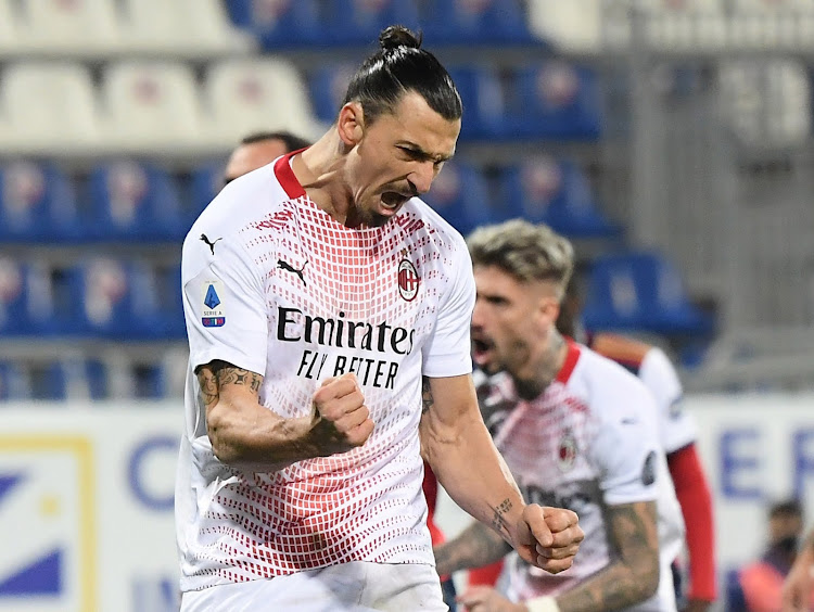 AC Milan's Zlatan Ibrahimovic celebrates scoring their first goal