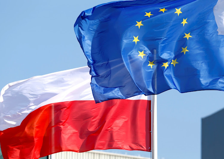 EU and Polish flags. Picture: REUTERS/INTS KALNINS