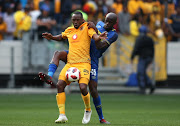 Bernard Parker of Kaizer Chiefs and Kwanda Mnogonyama of Cape Town City FC challenge for possession during the Absa Premiership match between Cape Town City FC and Kaizer Chiefs at Cape Town Stadium on September 15, 2018 in Cape Town, South Africa. 