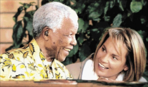 CLOSE RELATIONSHIP: Nelson Mandela and Zelda la Grange who worked as the stateman's personal assistant for years Photo: SYDNEY SESHIBEDI