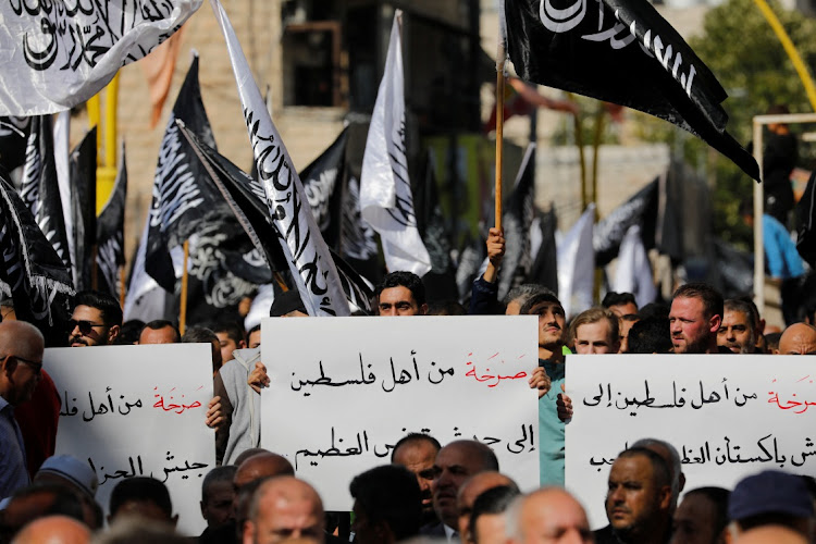 Demonstrators take part in a protest in support of Palestinians in Gaza, as the conflict between Israel and Hamas continues. Picture: MUSSA ISSA QAWASMA