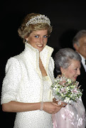 Princess Diana wears her high-collared ’Elvis’ dress, which will be on display at Kensington Palace for the rest of 2017.