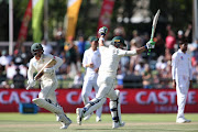 South African captain Faf du Plessis celebrates reaching his century during day 2 of the 2nd Castle Lager Test match between South Africa and Pakistan at PPC Newlands on January 04, 2019 in Cape Town, South Africa.