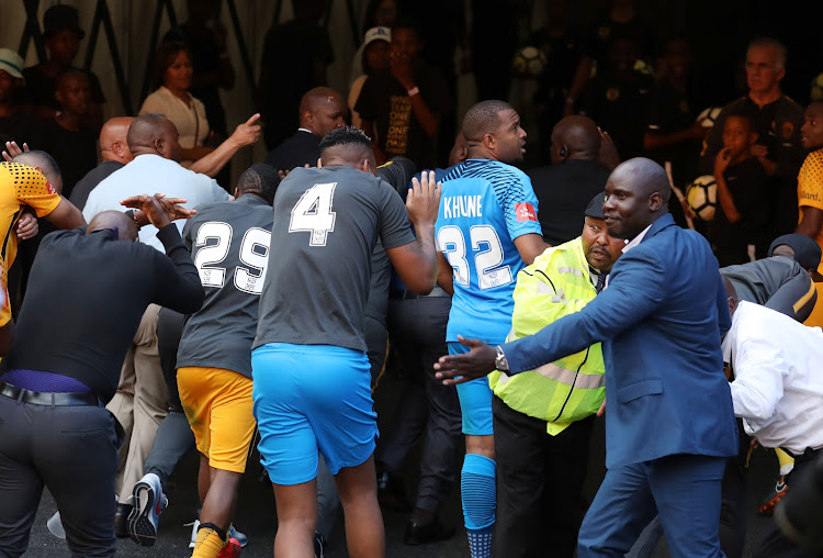 Angry Chiefs fans throwing objects to Steve Komphela, coach of Kaizer Chiefs and players leaving the field during the Absa Premiership 2017/18 match between Kaizer Chiefs and Chippa United at FNB Stadium, Johannesburg on 07 April 2018.