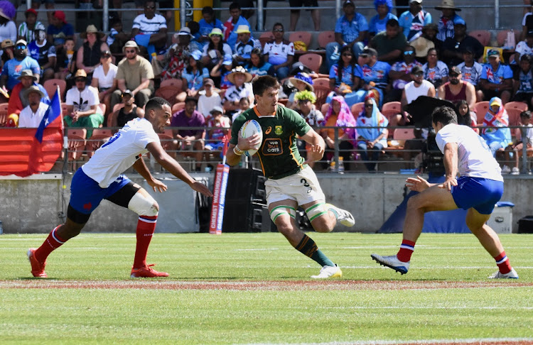 Impi Visser of South Africa scores a try during day two of the HSBC New Zealand Sevens match against France at Fred Jones Park in Hamilton on January 22 2023.