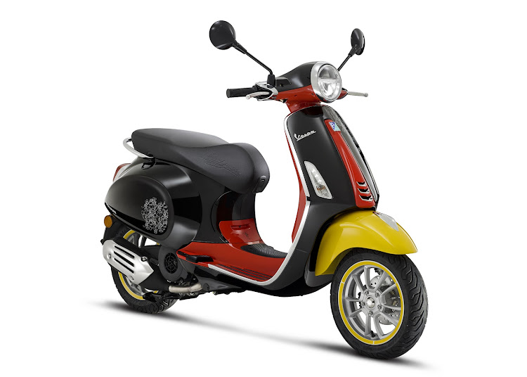 The special edition Vespa is painted in the colours of Disney’s iconic mouse. Picture: SUPPLIED