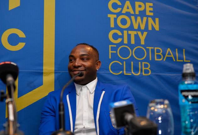 Newly appointed Cape Town City FC head coach Benni McCarthy smiles during his unveiling press conference at Radisson Blu Hotel on June 13, 2017 in Cape Town, South Africa.