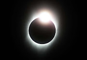 A total eclipse with the 'diamond ring' effect is seen from South Mike Sedar Park on August 21, 2017 in Casper, Wyoming.  Millions of people flocked to areas of the US that were in the 'path of totality' in order to experience a total solar eclipse. During the event, the moon passed in between the sun and the Earth, appearing to block the sun.  