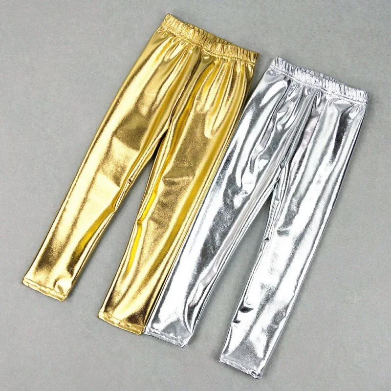 Meisjesmode glanzende gouden broek met elastische tailleband en sierrand, voor een stijlvolle look en comfort.