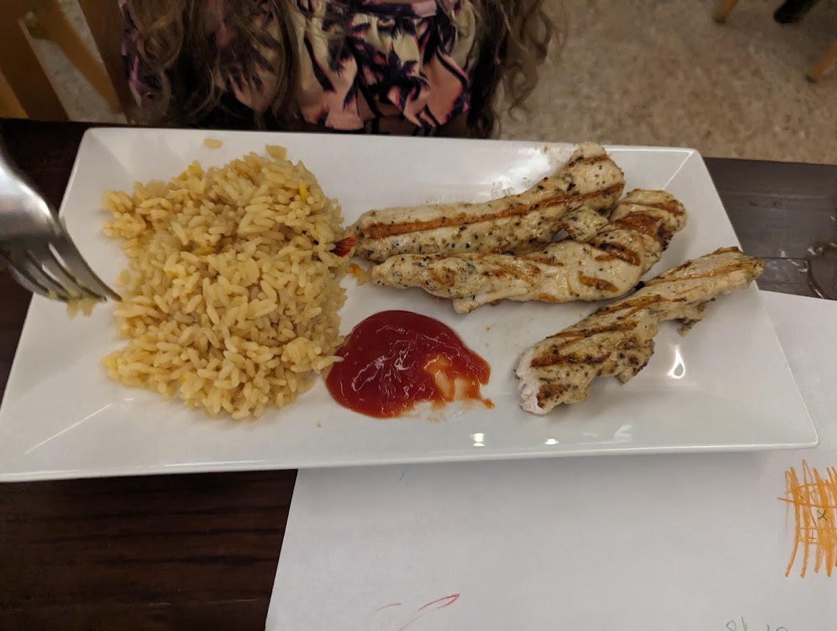 Kids grilled chicken strips and rice pilaf