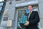 Jurie Roux (SA Rugby CEO) arrives to hand in the SA Rugby bid submission for the 2023 Rugby World Cup to Brett Gosper (World Rugby CEO) and Alan Gilpin (Head of Rugby World Cup) at World Rugby House on May 30, 2017 in Dublin, Ireland. 