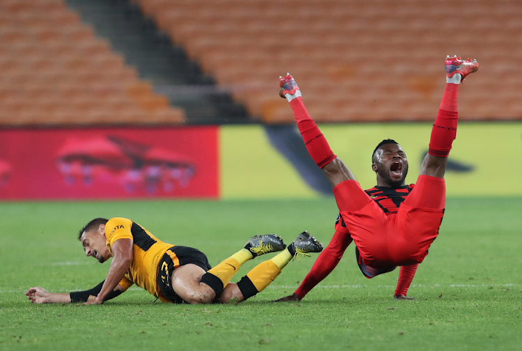 TS Galaxy striker Augustine Kwem is upended in a challenge by Kaizer Chiefs' Cole Alexander at FNB Stadium. Kwem had the best opportunties to score and was named player of the match.