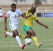 Banyana Banyana's Bongeka Gamede with Rasheedat Ajibade of Nigeria.