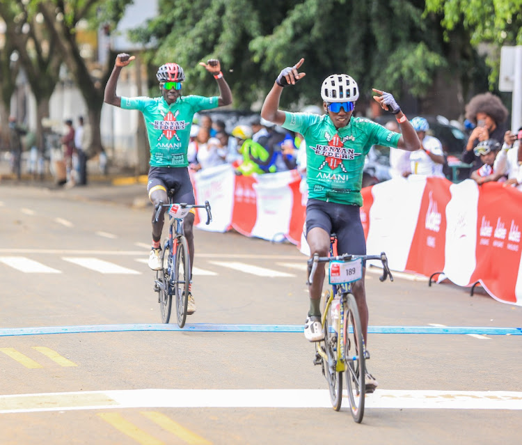 Evans Wangai leads teammate Paul Lumuria to the finish line during the Jubilee Live Free Race at KICC on Sunday