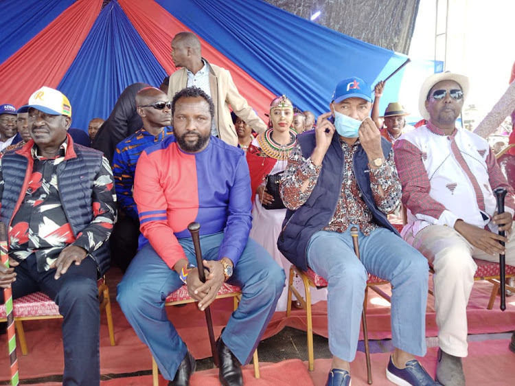 ODM leader Raila Odinga with Narok West Jubilee Parliamentary aspirant Julius ole Kirrokor, Peter Kenneth and Former GDC Managing Director Eng Johnson ole Nchoe during the campaign launch at Aitong area of Narok West sub county on Tuesday, June 28, 2022.