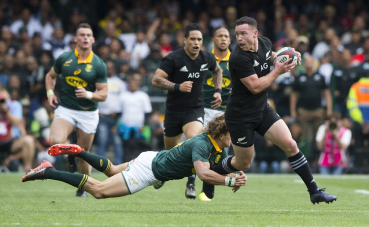 Ryan Crotty of New Zealand and Andries Coetzee of the Springbok Team during the Rugby Championship 2017 match between South Africa and New Zealand at DHL Newlands on October 07, 2017 in Cape Town, South Africa.