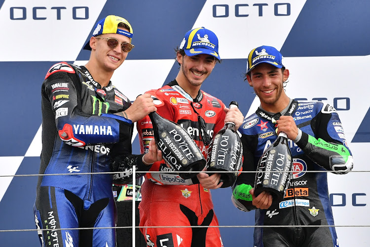 From left: Second-placed Fabio Quartararo, first-placed Francesco Bagnaia and third-placed Enea Bastianini. Picture: REUTERS