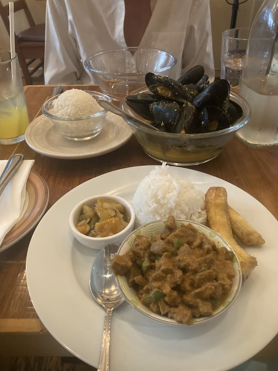 Goat curry with a mango chutney sauce and mussels in a coconut milk curry sauce. Amazing dessert Ube tikoy with champoy ice cream