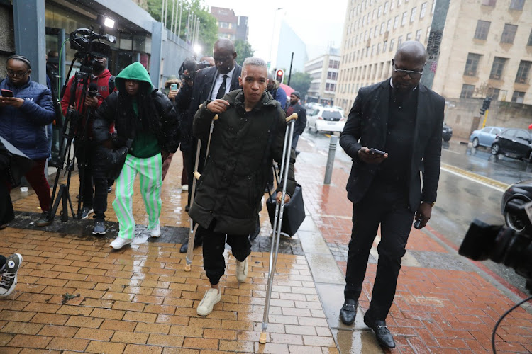 TikTok 'doctor' Matthew Lani leaves the Johannesburg magistrates court on October 31 2023 where he appeared after his arrest for allegedly impersonating a medical professional.