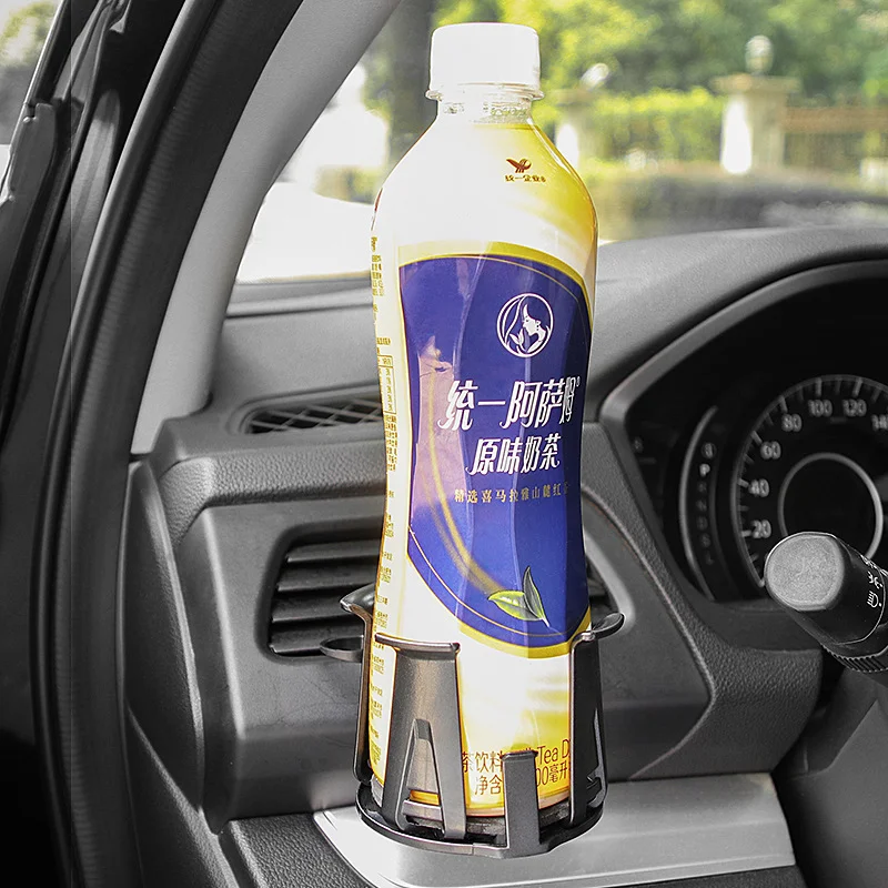 Auto luchtuitlaat drankhouder Houdt je drankje veilig en binnen handbereik Eenvoudige installatie en gebruik Ideaal voor onderweg.