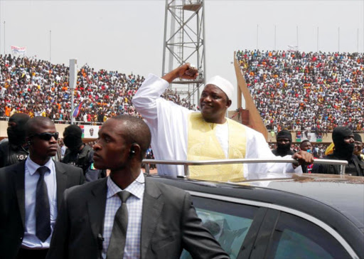 Gambian President Adama Barrow arrives for the swearing-in ceremony and the Gambia's Independence Day at the Independence Stadium, in Bakau, Gambia February 18, 2017. /REUTERS