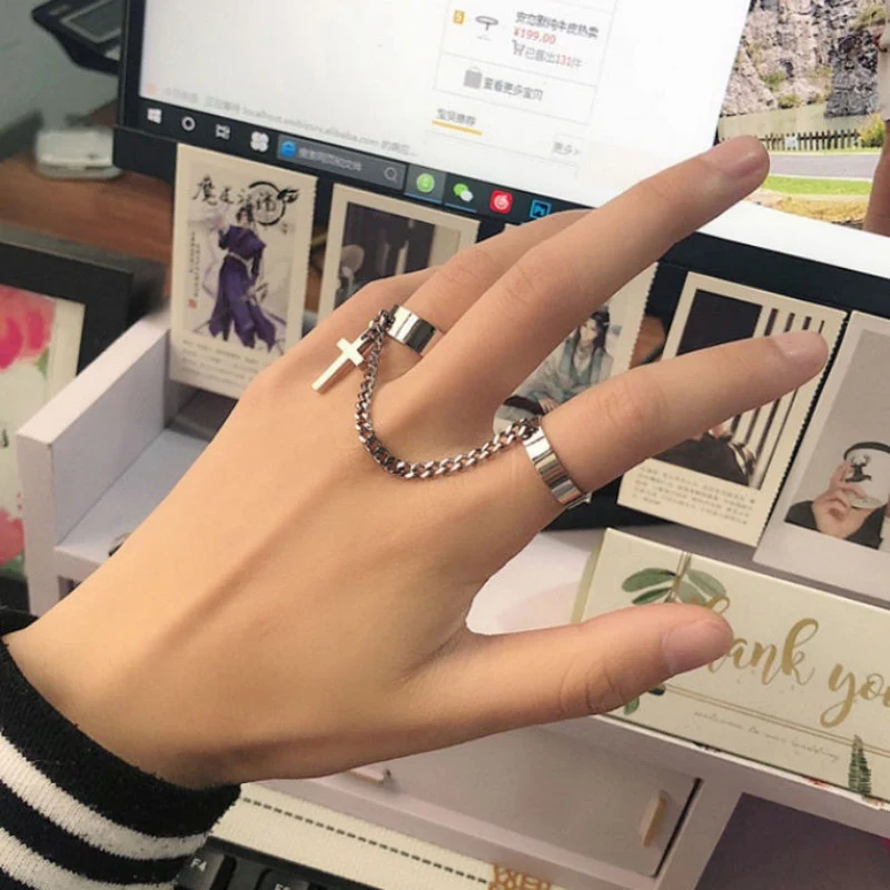 Europese en Amerikaanse punkring met gladde cirkel, ketting en kwastjes, stijlvolle mode-accessoire voor vrouwen.