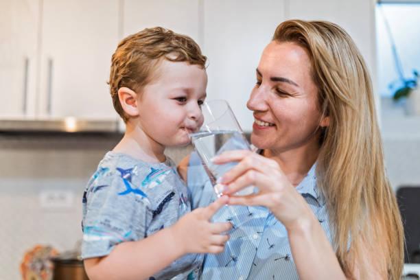 1,400+ Mom And Child Drinking Water Stock Photos, Pictures & Royalty-Free  Images - iStock