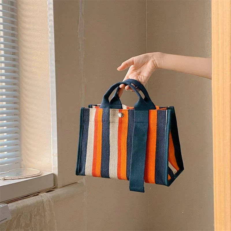 Sac de rangement portable en toile pour cadeau d'été femme. Idéal pour la plage, les voyages et le shopping. Léger et pratique.