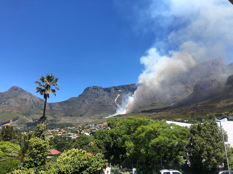 A fire that started at around midday on Sunday had been mostly contained by late afternoon