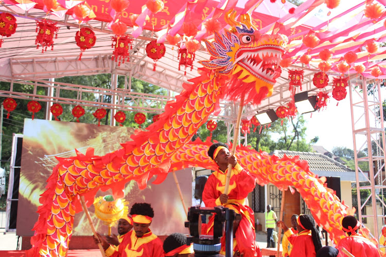 Confucius Institute at the University of Nairobi students perform a dragon dance during 'The Dragon is soaring and the drums are rolling for the Chinese New Year' event at their campus on February 7, 2024